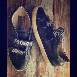Women black Golden Goose with buckle star.